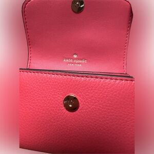 Original, never used Kate Spade wallet in brand new condition.